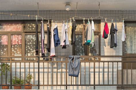 China Hong Kong Lamma Island Laundry On A Washing Line On A Balcony