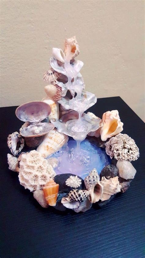 Artificial Waterfall Created Using Hot Glue And Decorated With Varied Seashells Collected
