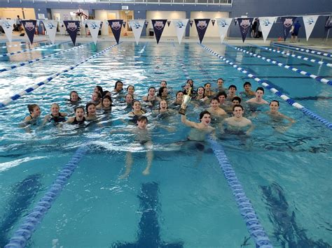Varsity Swim Teams Triumph To Extend Conference Championship Streaks