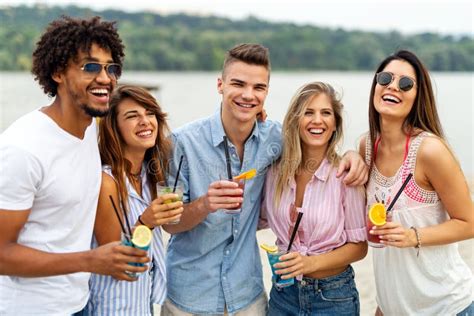 Portrait Of Friends Having Fun Together On Beach Vacation Student