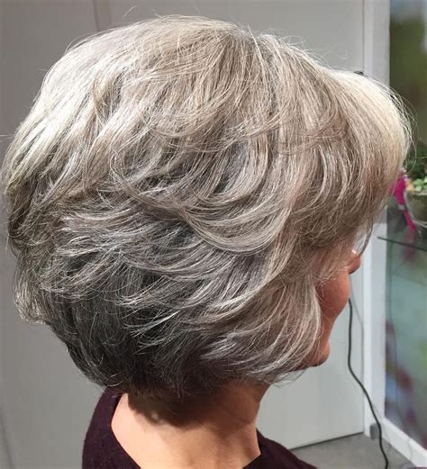 Our selection of the trendiest short hairstyles for women over 50 will help you choose the embrace your naturally gray hair color and enhance it by trying a silver balayage bob! Layered Haircut for Over 60 | Short Hair Models