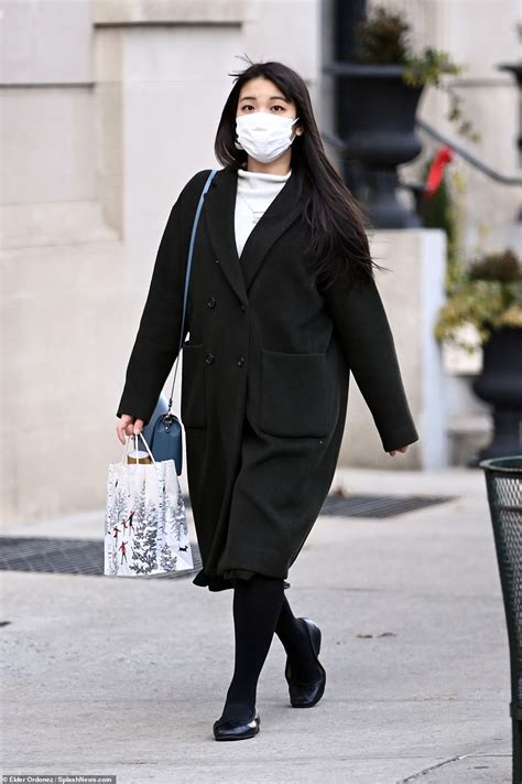 princess mako is spotted carrying christmas ts while stopping by nyc apartment building duk