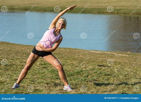 Young Woman Stretching Outdoors Before Jogging Stock Image Image Of Outdoors Alone 24618577