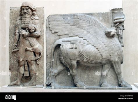 Winged Human Headed Bull Human Figure With Baby Lion Sumerian And