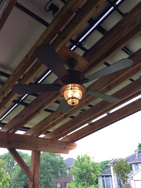 It has to be made for outdoor use. 15 Ideas of Outdoor Ceiling Fans For Pergola