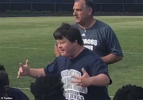 Man Born With Down Syndrome Returns To His High School To Give Football