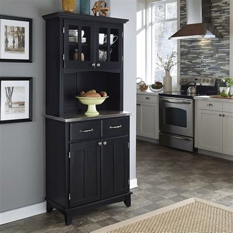 Transform a small kitchen hutch from a solely decorative piece into functional storage space. Shop Home Styles Black/Stainless Steel Rectangular Kitchen ...