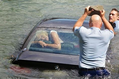 Incredible Pictures Of How A Lady Was Saved After Her Car Plunged Into