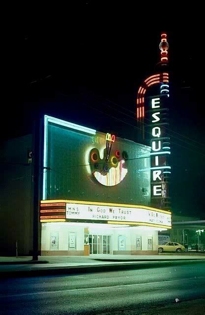 It opened with blue skies and two years before the mast. The Esquire Theatre lit up in neon lights in the Dallas ...