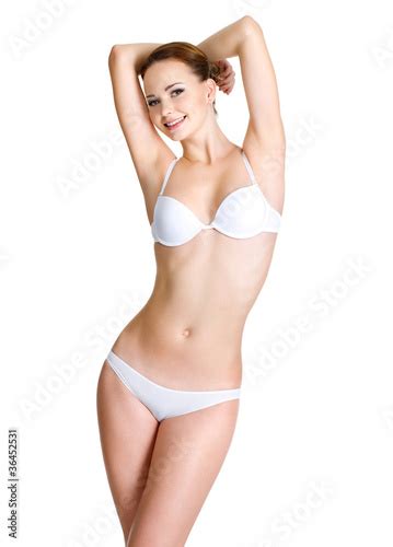 Happy young woman with beautiful perfect body Stock 사진 Adobe Stock