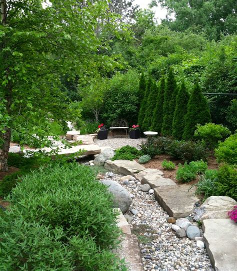 Dry Stream Bed With Seating Area Rustic Garden Detroit By Dc