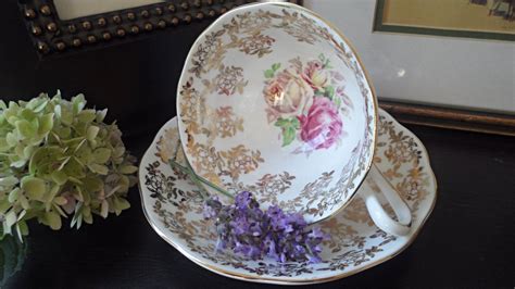 royal-albert-vintage-teacup-and-saucer,-gold-chintz-and