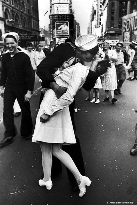 V J Day In Times Square Is A Photograph By Alfred Eisenstaedt That Portrays An American Sailor