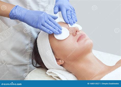 Beautician Cleanses The Skin On The Face From Acne And Blackheads On