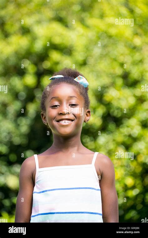 Portrait Of Mixed Race Girl Smiling Stock Photo Alamy