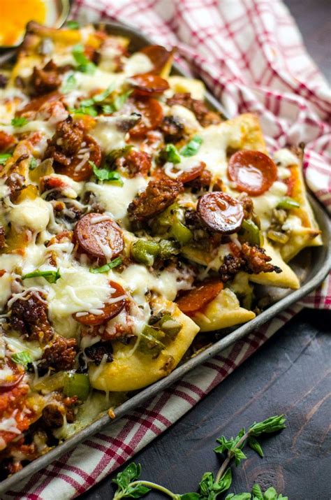 Bake dish at 350 degree fahrenheit for 8 minutes and enjoy! Loaded Pizza Nachos with Creamy Garlic White Sauce - Host ...