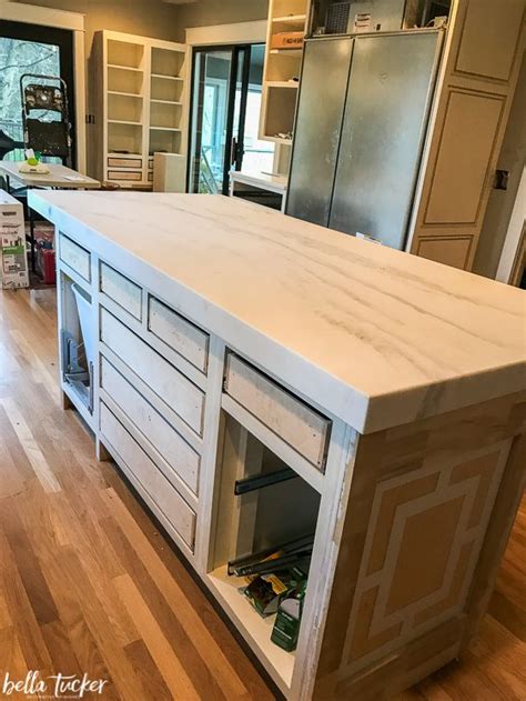 A flat mitered edge, available at an angle of 45° or less, to the cut edge of the glass panel. Tucker Kitchen Remodel- Week 4 - Bella Tucker