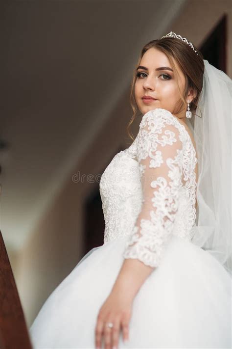 Cute Bride Dressed At Home In A Wedding Dress Stock Image Image Of