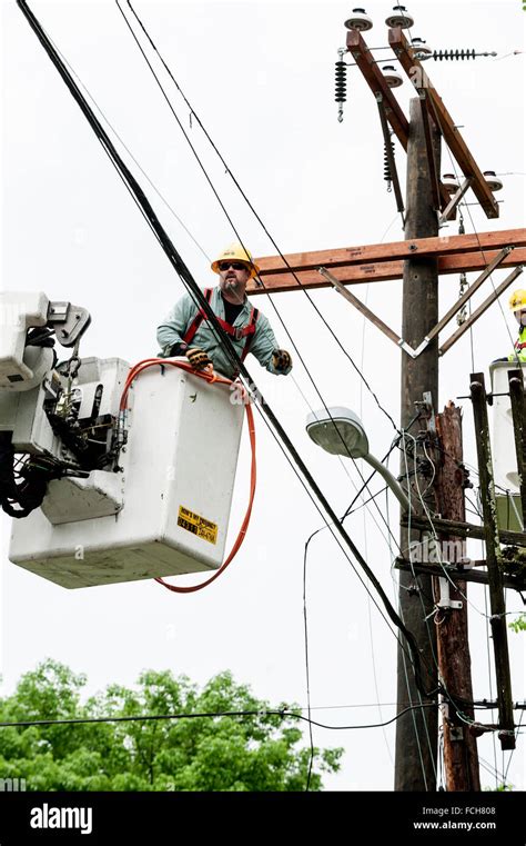 Workers Replacing An Electrical Pole Stock Photo Alamy
