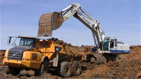 Liebherr R964c Excavator With Gps Loading Volvo A35 Dumpers Youtube