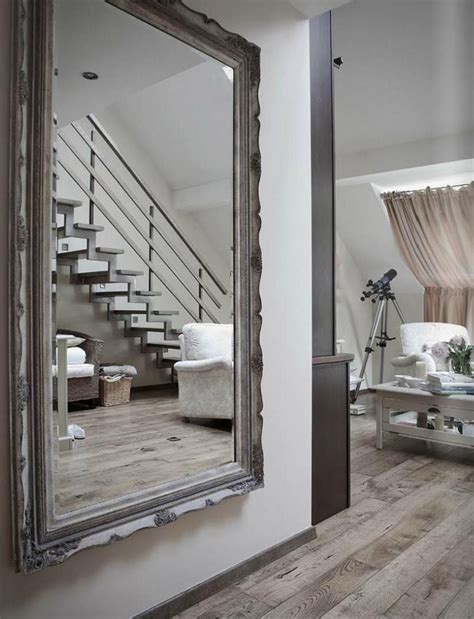 A mirror hung to reflect a window gives the illusion of another window in the room. 15 Photos Unusual Mirrors for Sale | Mirror Ideas
