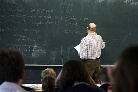 Teacher Writing On Board Stock Photos Pictures And Royalty Free Images