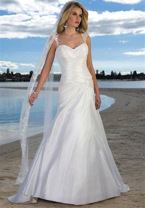 Beach wedding dresses are perfect for brides who love simple styles and do not want to put too much effort on doing themselves up. 25 Beautiful Beach Wedding Dresses - The WoW Style