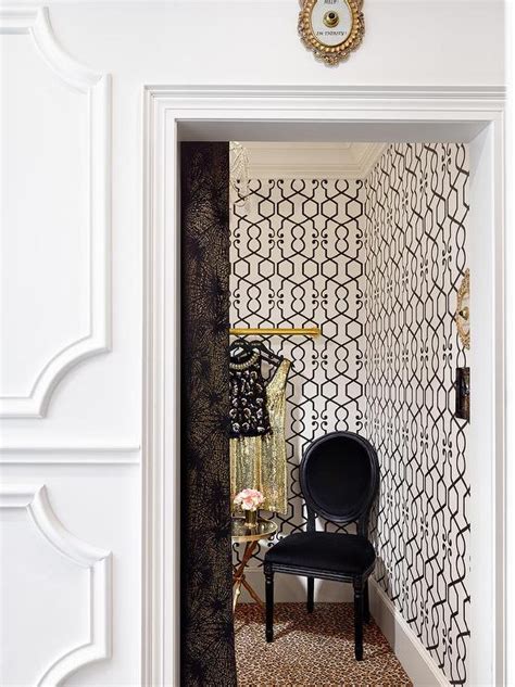 White And Black Closet With Leopard Print Carpeting