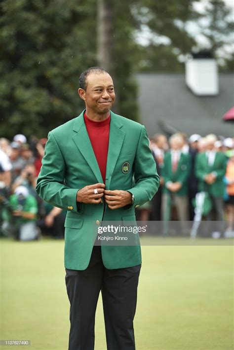 Tiger Woods Victorious In Green Jacket During Ceremony After Winning