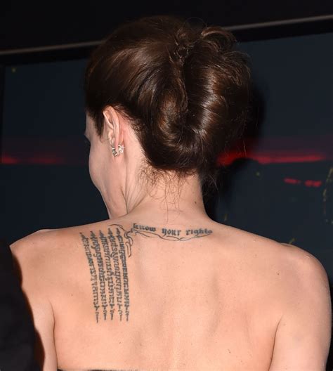 Angelina Jolie At 40 Journey Through Stardom And Motherhood Celebrity Tattoos Angelina Jolie