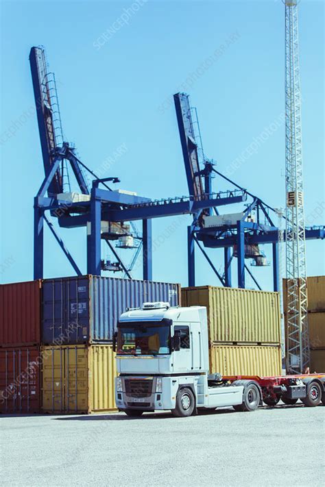 Cranes Over Cargo Containers And Truck Stock Image F0149540
