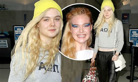 Makeup Free Elle Fanning Touches Down At Lax After Stepping Out In