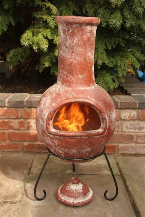 Original smokeless fire pits were two small pits in the ground a large hole for the combustion chamber and chimney and a smaller one as an air intake tunnel. Ceramic Fire Pit Chimney | Fire Pit Design Ideas