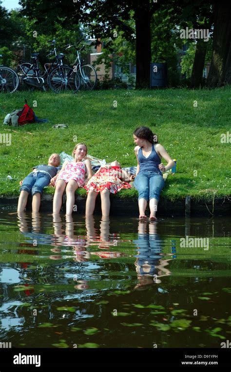 Young Girls Cooling Off On A Hot Summers Day In Leiden The