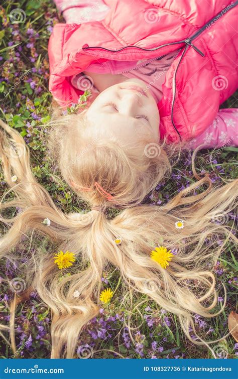 Little Lovely Child Lying In The Meadow Stock Photo Image Of Human
