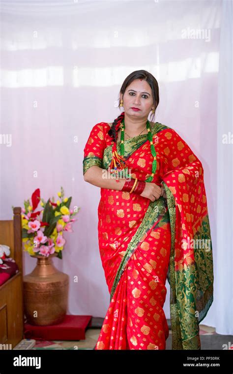 Beautiful Nepali Women In A Traditional Dress Up With Wearing Saree And