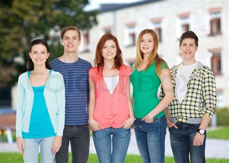 Group Of Smiling Students Standing Stock Image Colourbox
