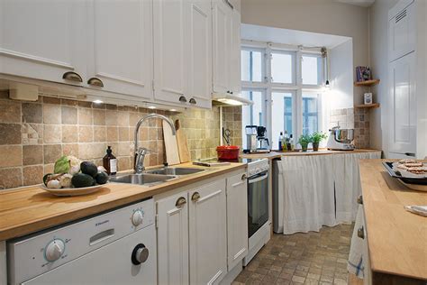 Photo of a scandinavian kitchen in london. Clean Timeless Beauty Materiallized in Scandinavian ...
