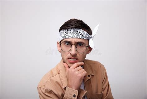 Funny Young Man With Glasses Looks Into The Camera Stock Image Image