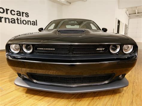 Check out the full specs of the 2015 dodge challenger srt 392, from performance and fuel economy to colors and materials. 2015 Dodge Challenger SRT 392 Hemi