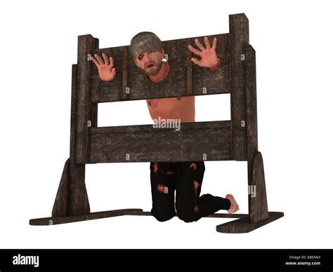 Prisoner With Head And Hands Restrained In Pillory Isolated On White