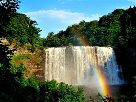 Beautiful Waterfall With A Rainbow Waterfall Wallpaper Waterfall