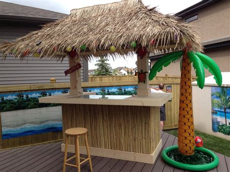 i had this tiki bar built by a friend he did an amazing job the centre glass has sand shells