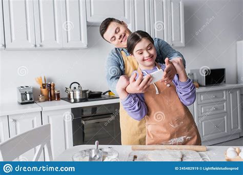 Cheerful Couple With Down Syndrome Taking Stock Image Image Of People