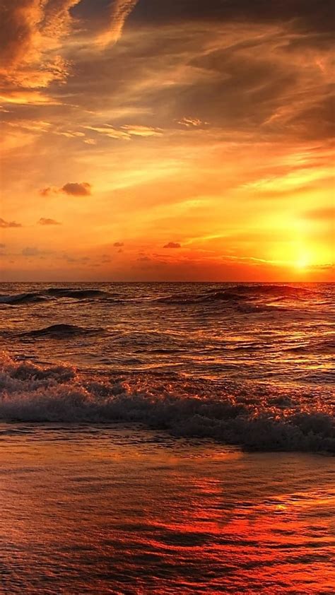 Glorious Red And Orange Sunset At The North Sea Wallpaper Backiee