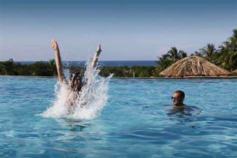 Free Images Man Sea Woman Jump Vacation Splash Swimming Pool Couple Splashing Happy