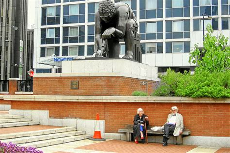 Statue Of Newton At The British Library Couple In Front