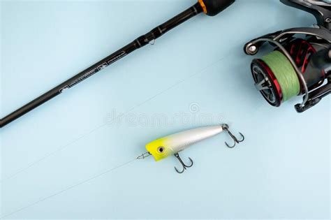 Bass Fishing Popper Lure On The Blue Backdrop Stock Photo Image Of