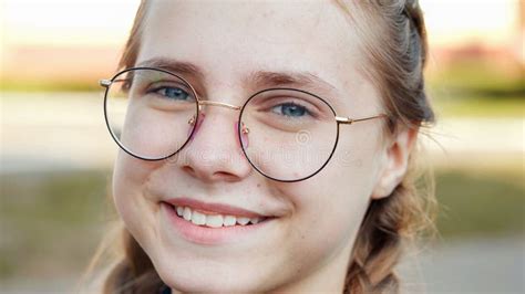 A Teenage Girl Wearing Glasses Close Up Of Her Face Stock Image