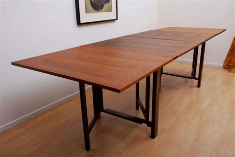 Some folding dining tables are designed to unfold and become larger than usual, such as drop leaf tables. 20 Best Collection of Wood Folding Dining Tables | Dining ...